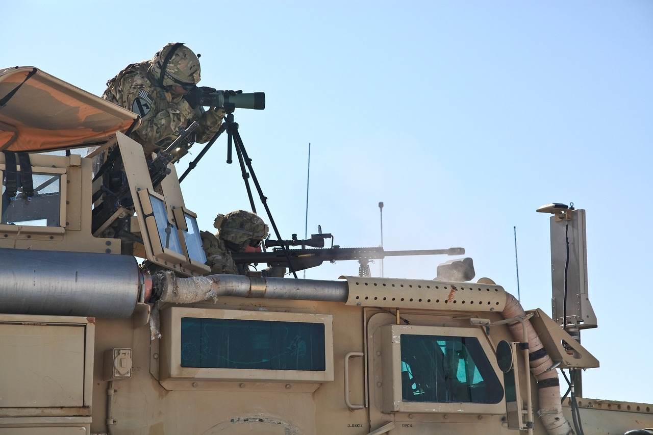 Gun and soldiers. 